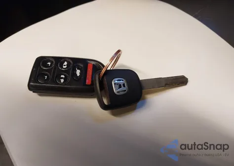 2007 Honda Odyssey Ex-L z USA, uszkodzony, nr VIN 5FNRL38717B013014